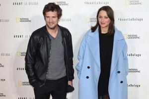 Беременную «любовницу Бреда Питта» сфотографировали с супругом