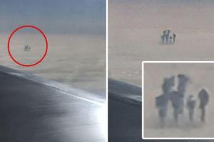 Пассажир самолета сфотографировал странные темные фигуры, стоящие прямо на облаках