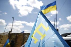 Активисты пели гимн и вывесили флаг Украины под носом у оккупантов на Чонгаре