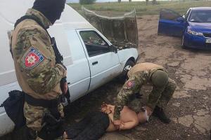 На Запорожье полицейские совместно с СБУ нейтрализовали группу торговцев оружием из зоны АТО