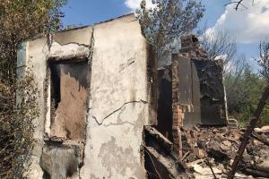 Боевики обстреляли дома мирных жителей в Пивденном: обнародованы фото разрушений