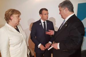 Порошенко, Макрон и Меркель начали переговоры о "выборах" в ОРДЛО
