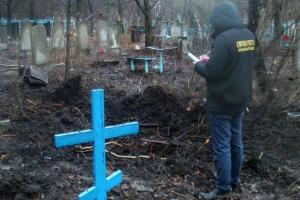 Циничный обстрел кладбища в Попасной квалифицировали как нарушение законов и обычаев войны