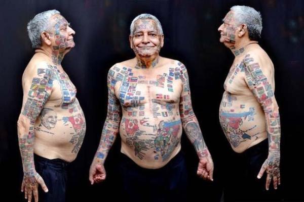 Житель Индии разрисовал свое тело флагами всех стран мира Житель Индии разрисовал свое тело флагами всех стран мира