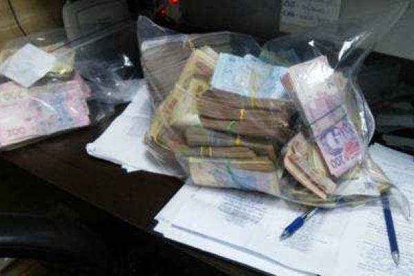 В Киеве "накрыли" сеть нелегальных обменников валюты В Киеве "накрыли" сеть нелегальных обменников валюты