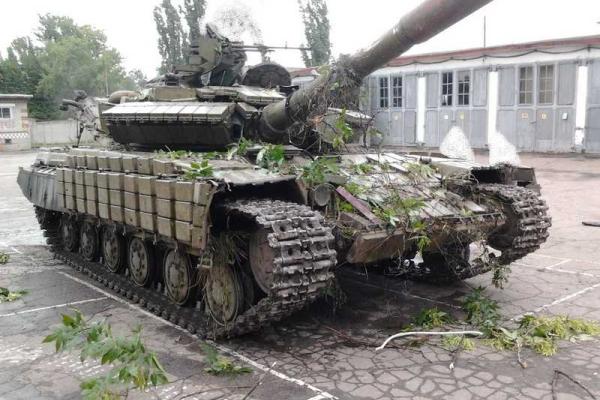 Военные показали отбитые у террористов российские "Град" и "Шмель" Военные показали отбитые у террористов российские "Град" и "Шмель"