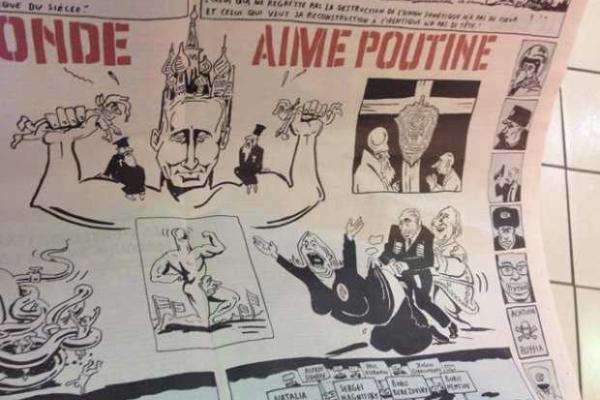 Свежий номер французской сатирической газеты вышел с огромной карикатурой на Путина Свежий номер французской сатирической газеты вышел с огромной карикатурой на Путина