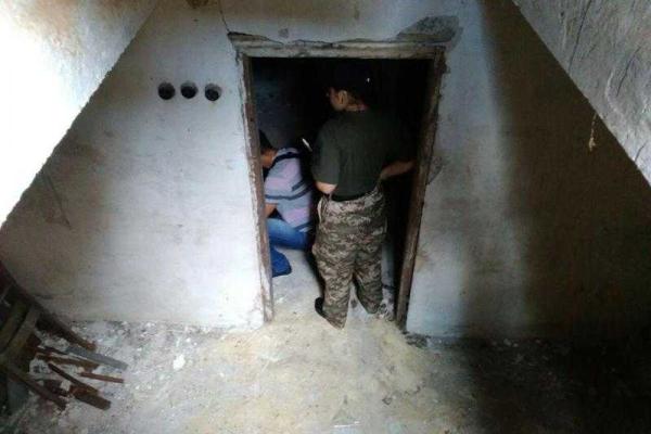 В одном из гаражей Бердянска обнаружен склад боеприпасов