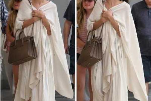 Папарацци засняли Анджелину Джоли в странной одежде на прогулке с детьми Папарацци засняли Анджелину Джоли в странной одежде на прогулке с детьми