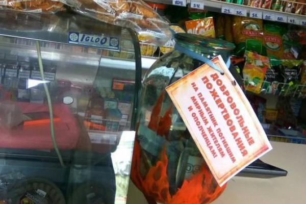 Трехлитровая банка на прилавке магазина: в "ЛНР" у людей клянчат деньги на памятник боевикам